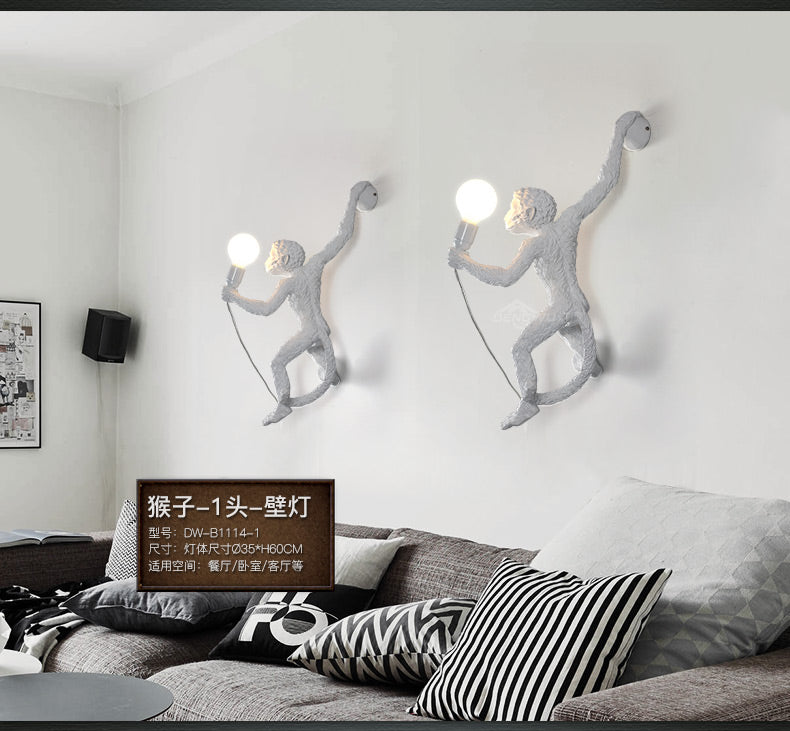 Monkey deals wall sconce